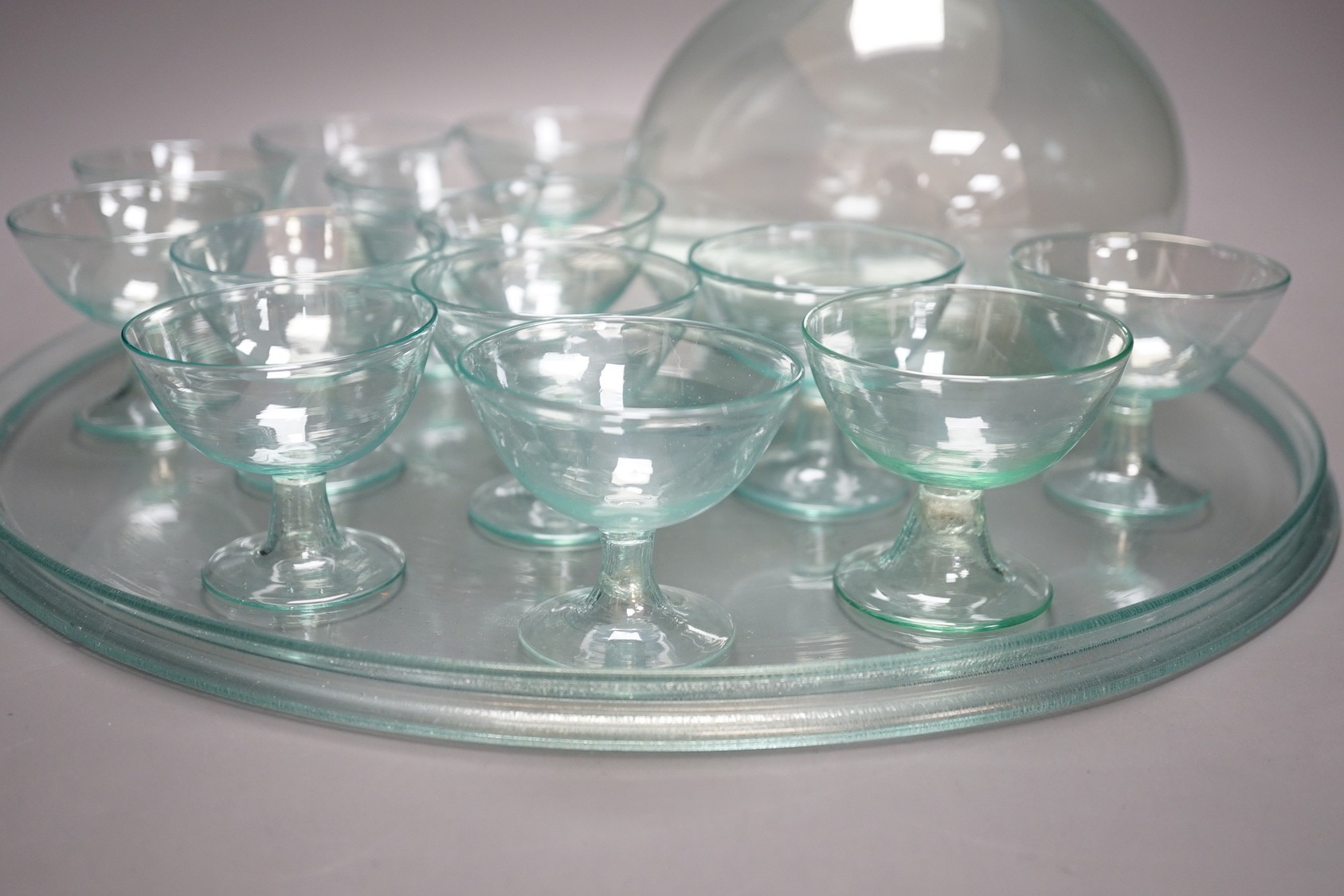 A 1930's Murano irridescent aqua glass liqueur set